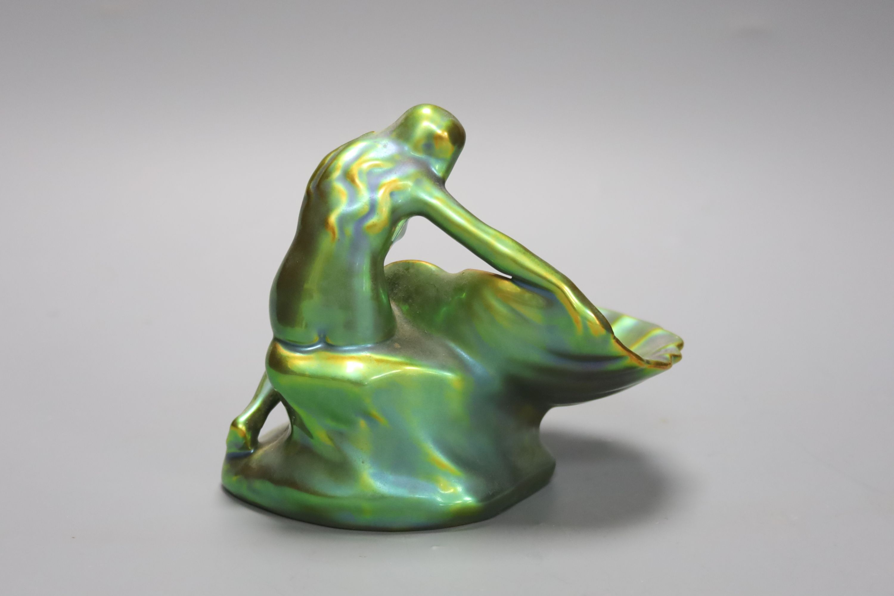 A Zsolnay eosin figural dish, height 12cm